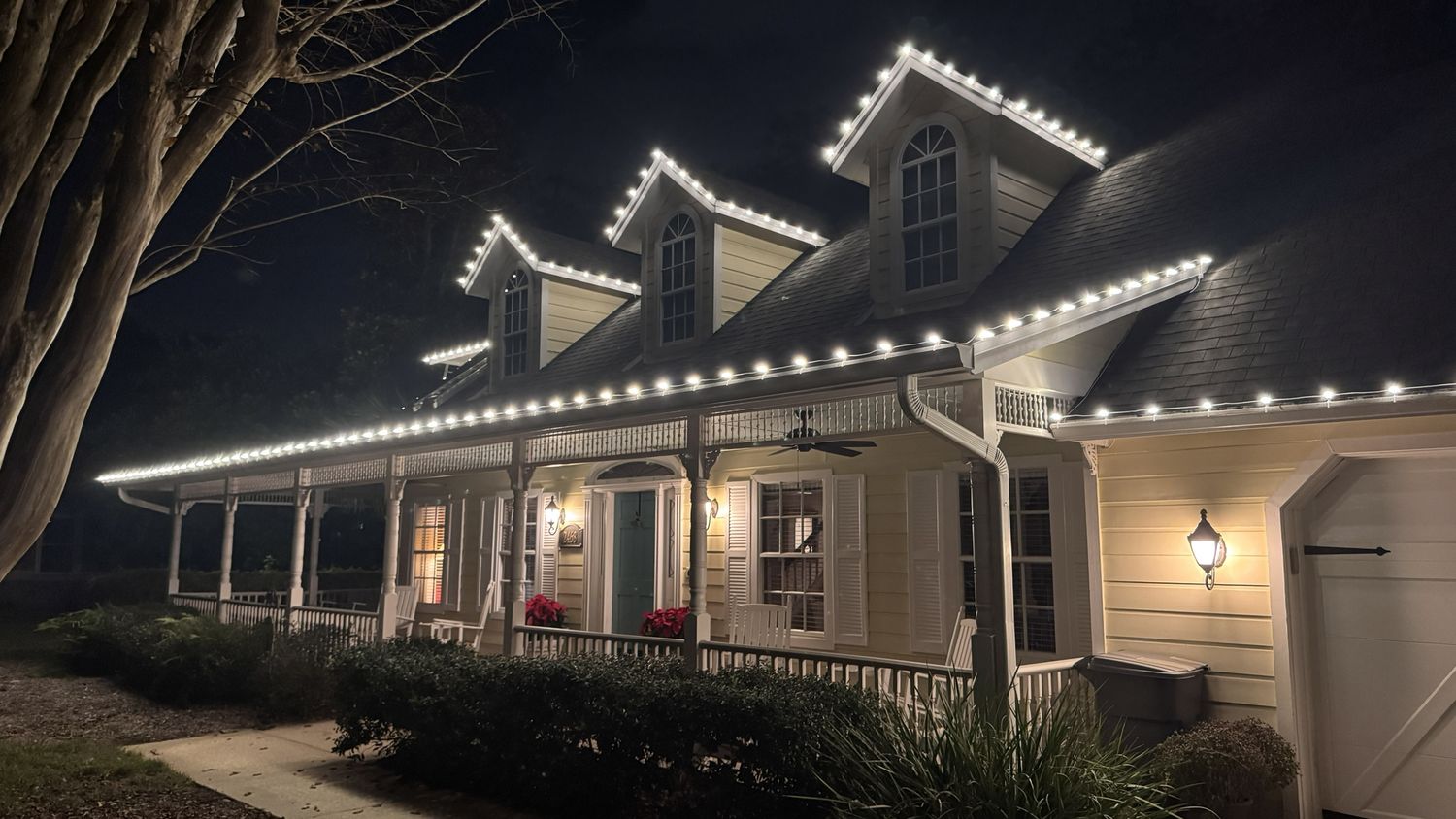 Home with permanent holiday lighting installed by Sun Sands