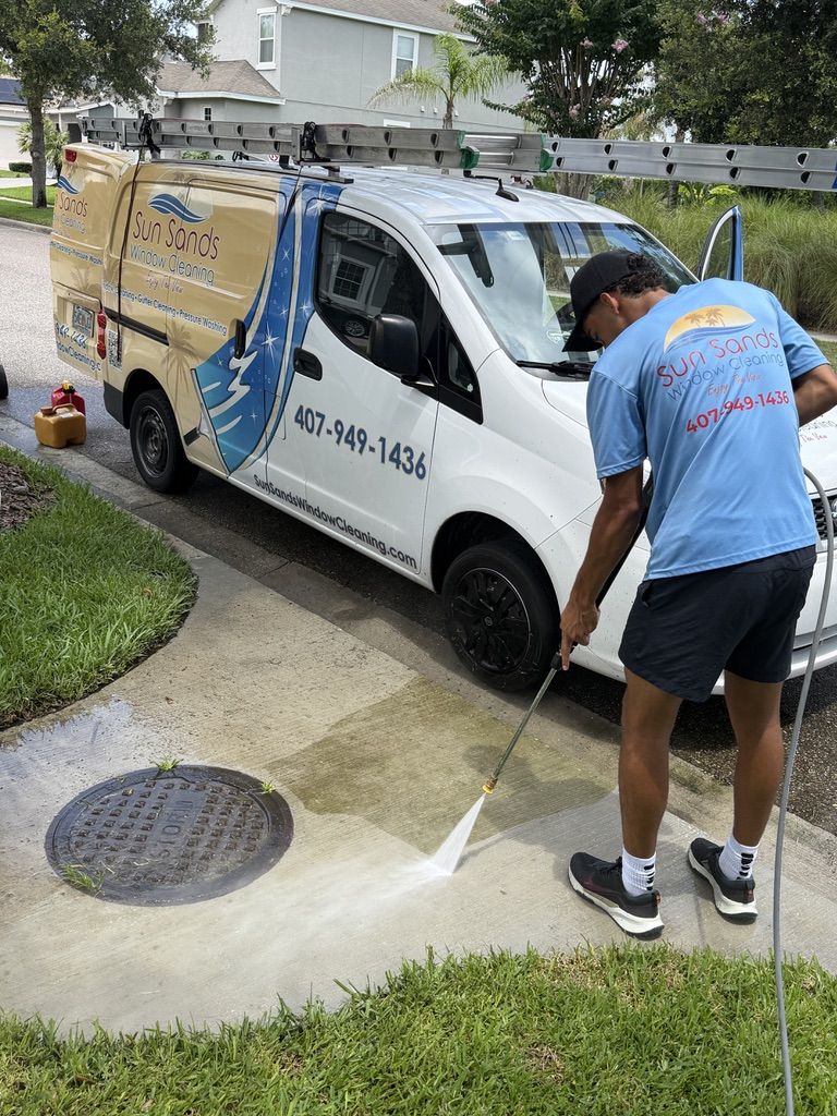 The Sun Sands Window Cleaning team and van